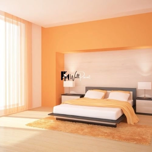 A bedroom interior showcasing a beige and orange color scheme, a comfortable bed, and a minimalist decor.