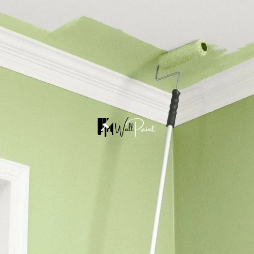 Interior painting, possibly a wall painting Dubai project, showing a ceiling being painted green.
