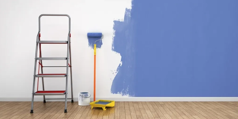Partially painted blue wall, representing Villa Painting Services.