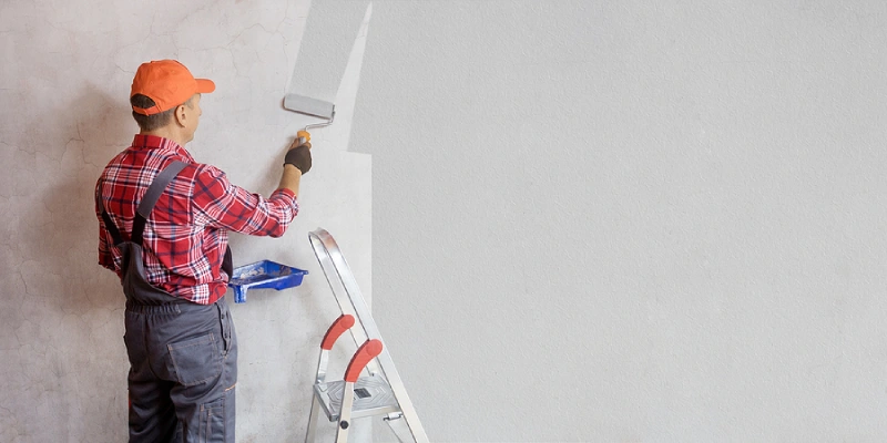 Professional wall paint Dubai services in action.