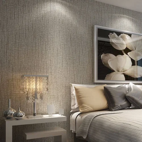 Textured wallpaper enhancing the sophisticated look of a room.