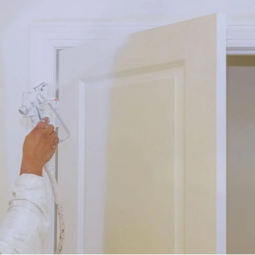 Sleek door painting using trending chalk paint colors, matte finish for vintage-style makeovers.