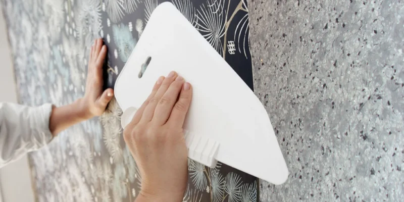 Professional wallpaper fixing service with seamless wall design and stylish interiors.