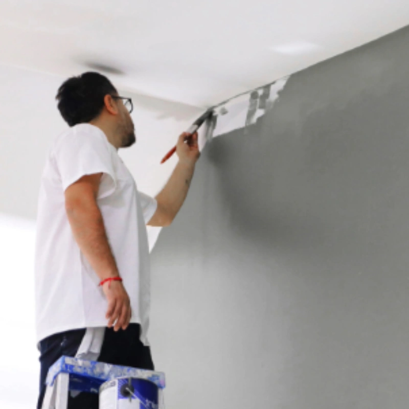 Expert Painter are Paint the living room wall with best wall painting services in Dubai